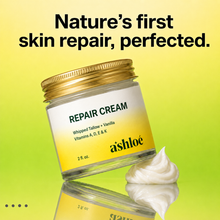 Ashloé Repair Cream jar floating above whipped cream